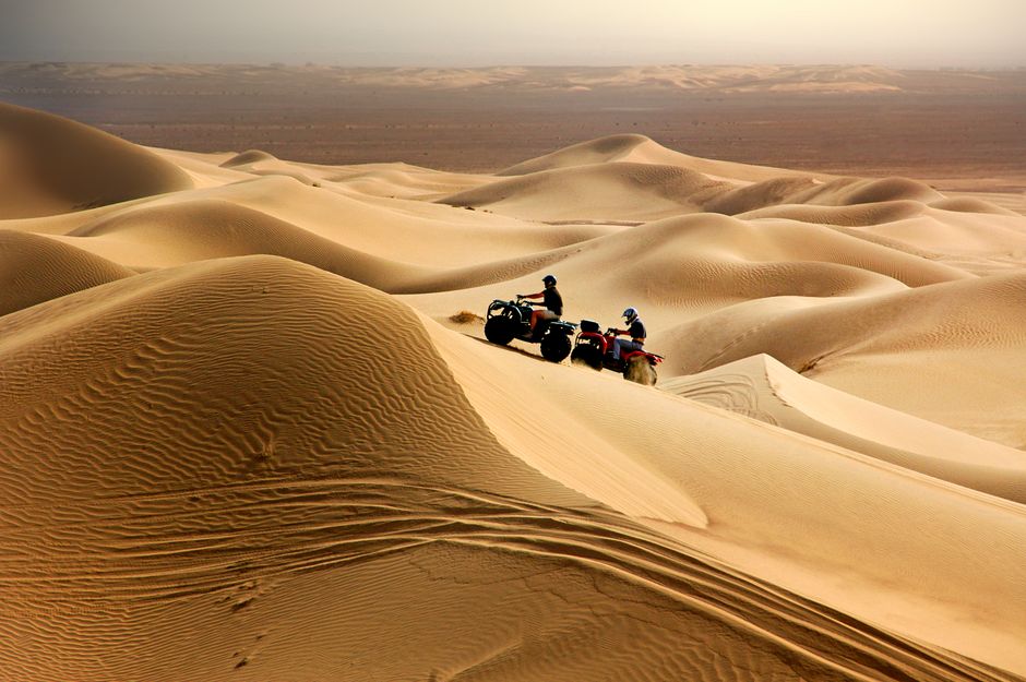 Quad i sandboarding